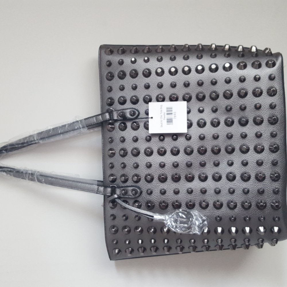 Traci Lynn stud n, chic tote bag